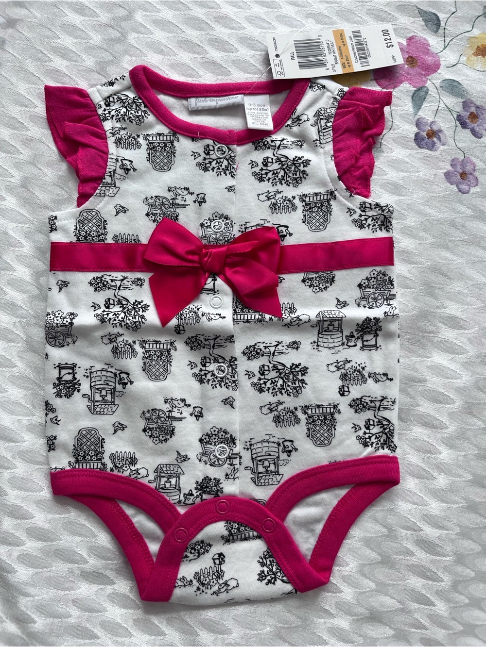 First Impressions White One-Piece Bodysuit with Hot Pink Trim and Bow